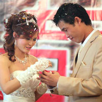 Hiệp gà và Thu Trang trong đám cưới