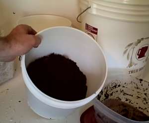 [Image: 1421917127-fill-bucket-halfway-with-coffee-grounds.jpg]